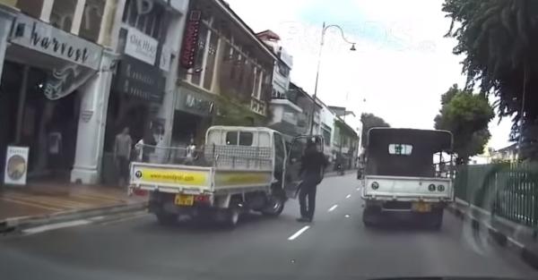 Another case of road rage, as lorry almost runs over biker who broke his side mirror